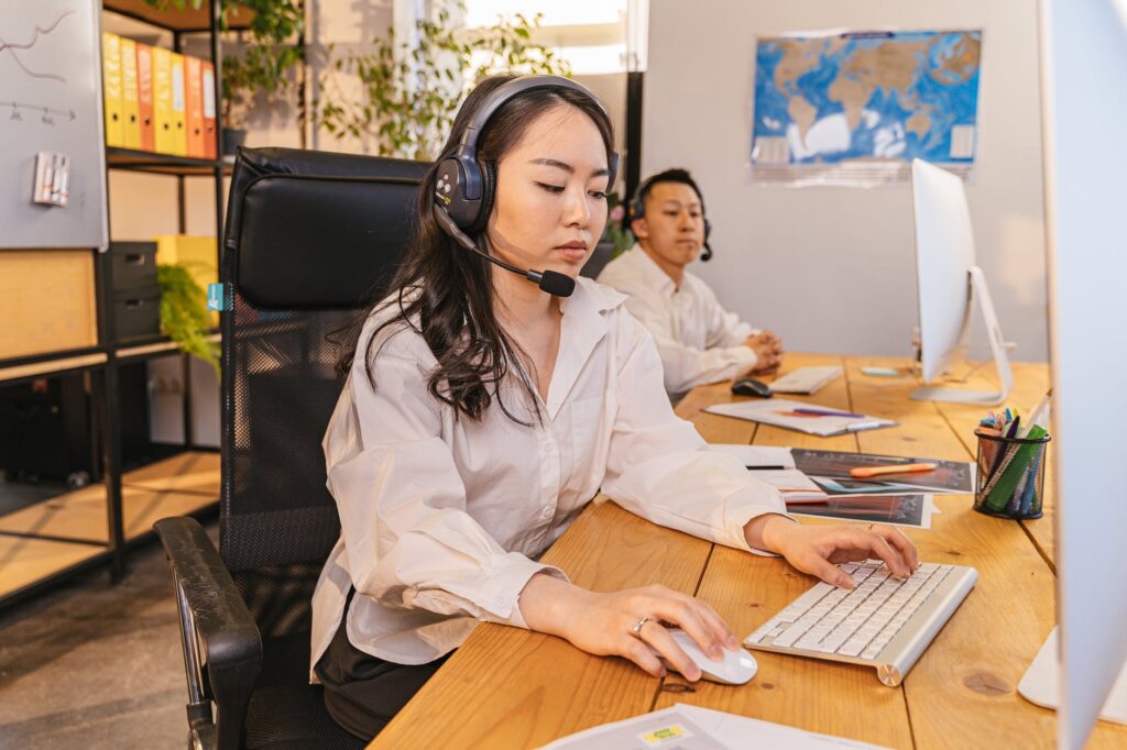 people working in call center office